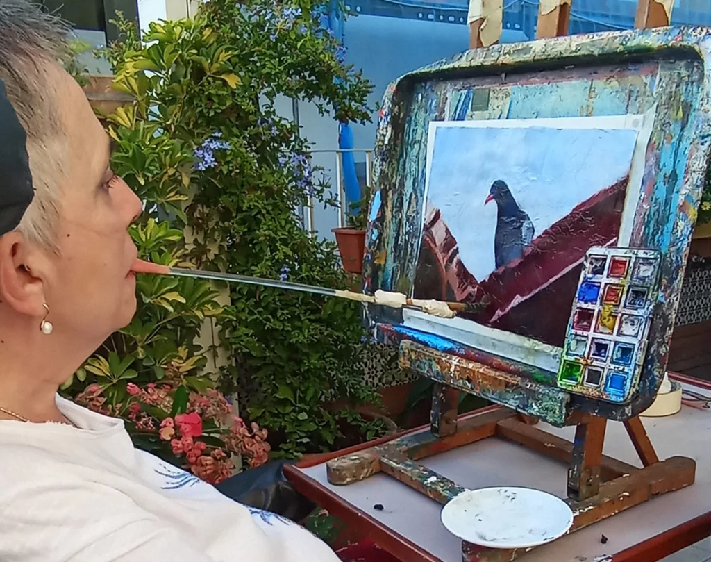 Mavi Asociación de Pintores con la Boca y con el Pie