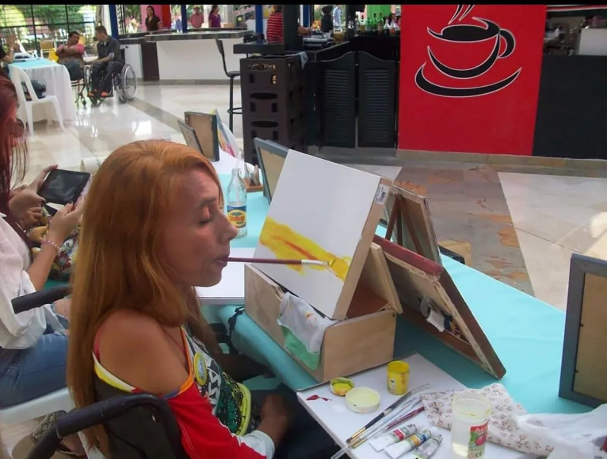 María Eugenia Reyes Manchola Asociación de Pintores con la Boca y con el Pie