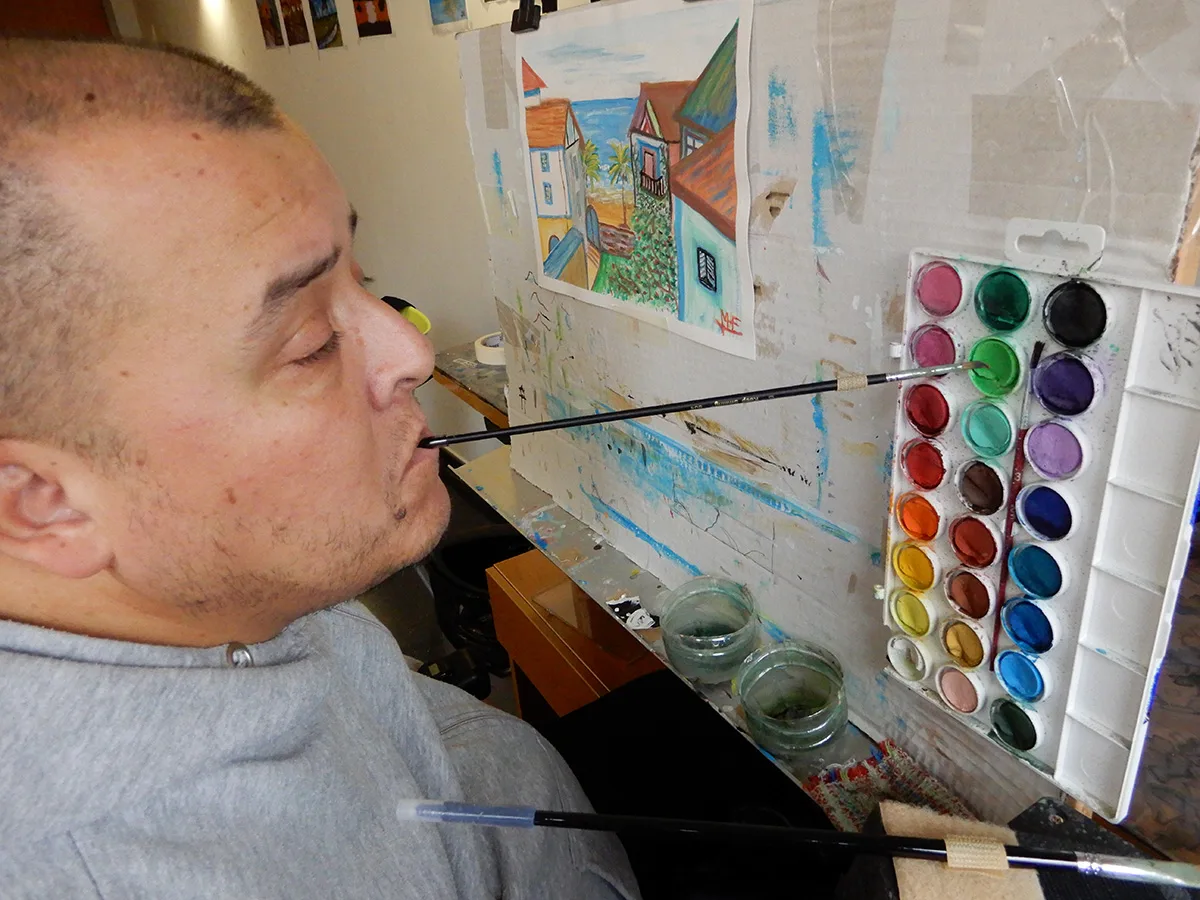 Mohamed Asociación de Pintores con la Boca y con el Pie